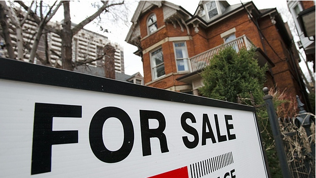 House prices overvalued in 11 of Canada's 15 biggest cities, CMHC says